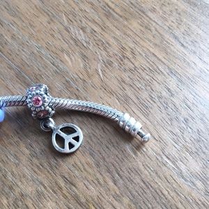 Sterling silver and pink peace Pandora charm!